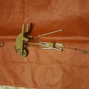 Mini wheelbarrow wind chime w hanging spade